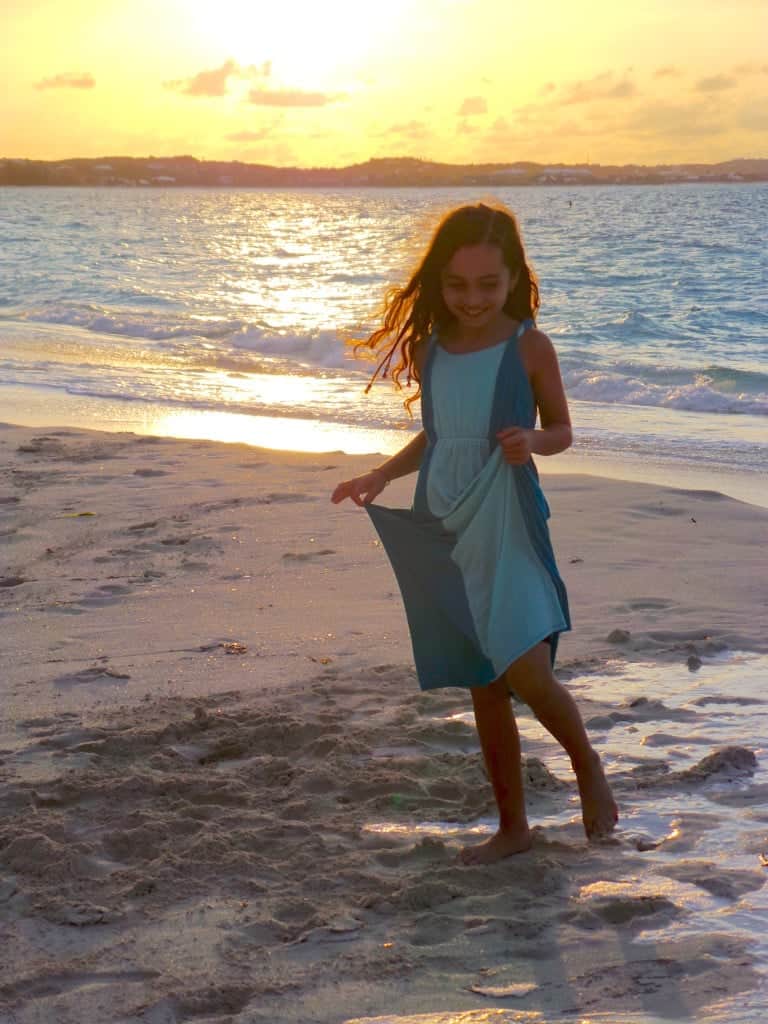 Girl enjoying the sunset at Beaches Turks and Caicos