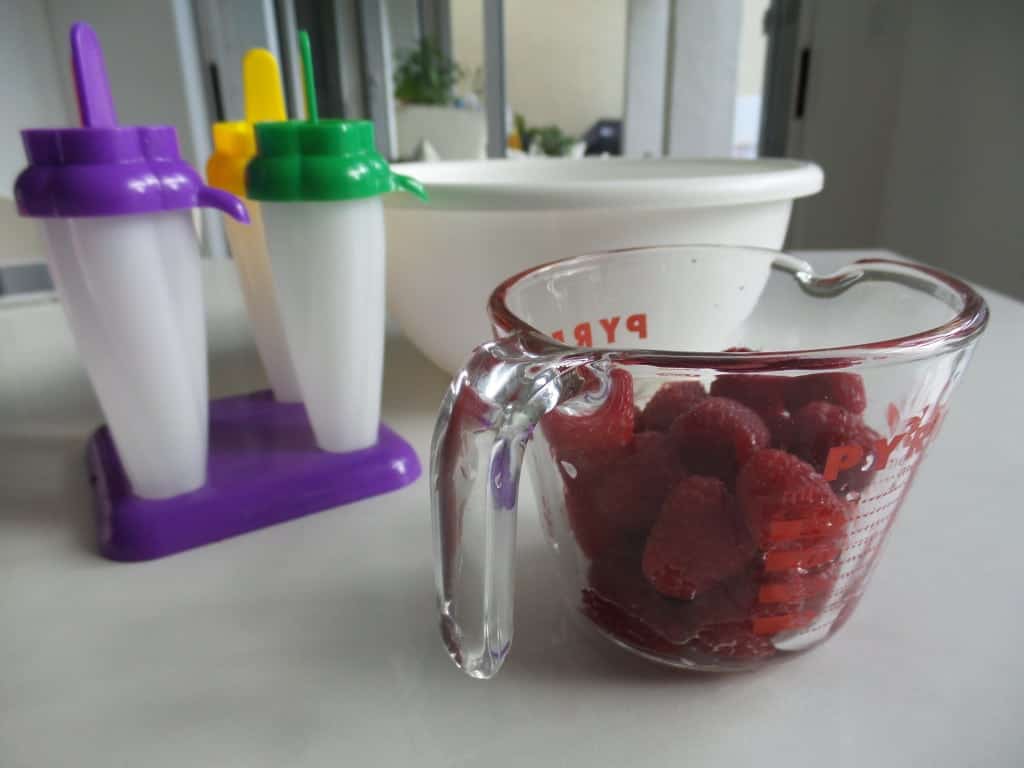 Make healthy yogurt pops with fresh raspberries
