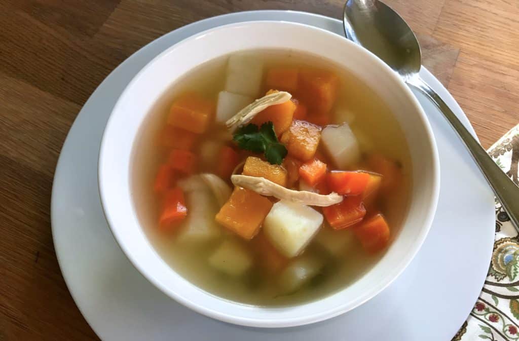 Bowl of delicious and simple chicken soup