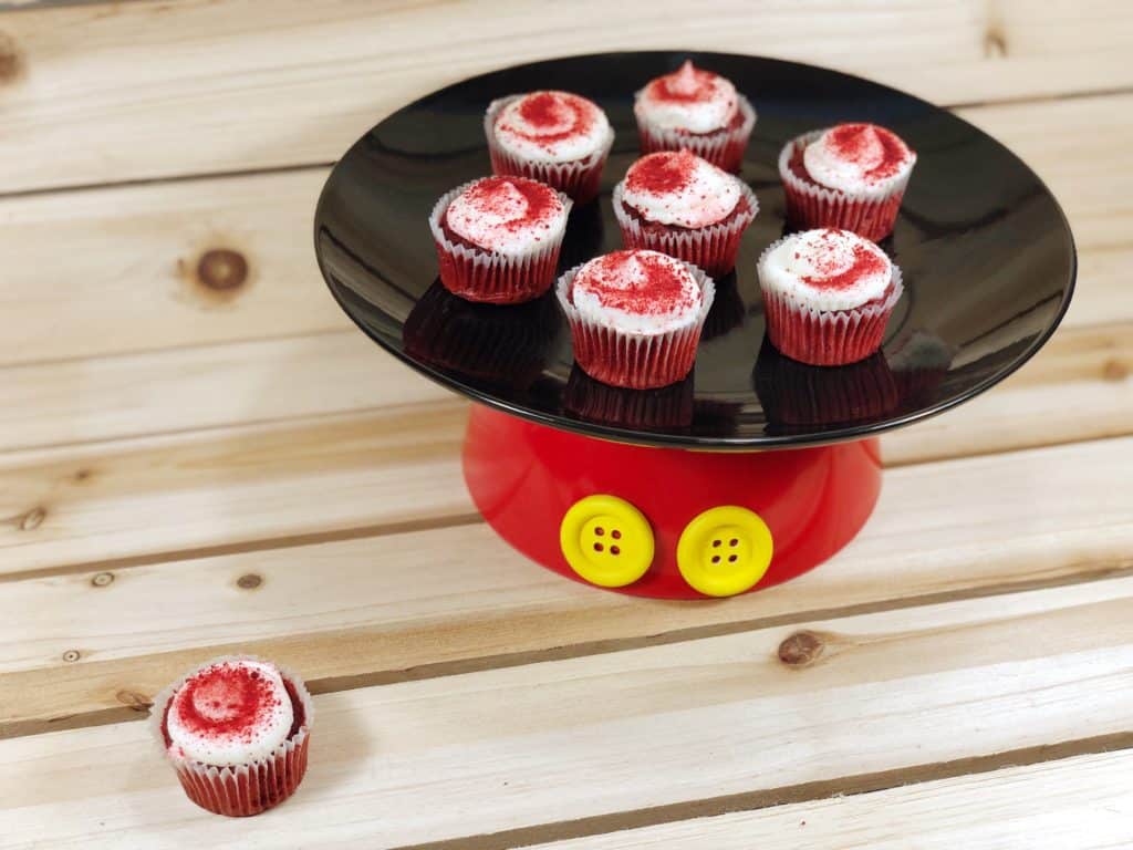 This adorable Mickey Mouse inspired DIY only takes 15 minutes to make! Use the dessert pedestal to display cupcakes and cookies at your next Disney-themed party.