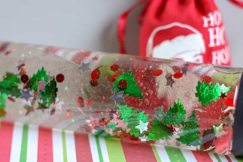 This cool craft for kids is also extremely relaxing. Here's how to make a Christmas sensory bottle, step by step.
