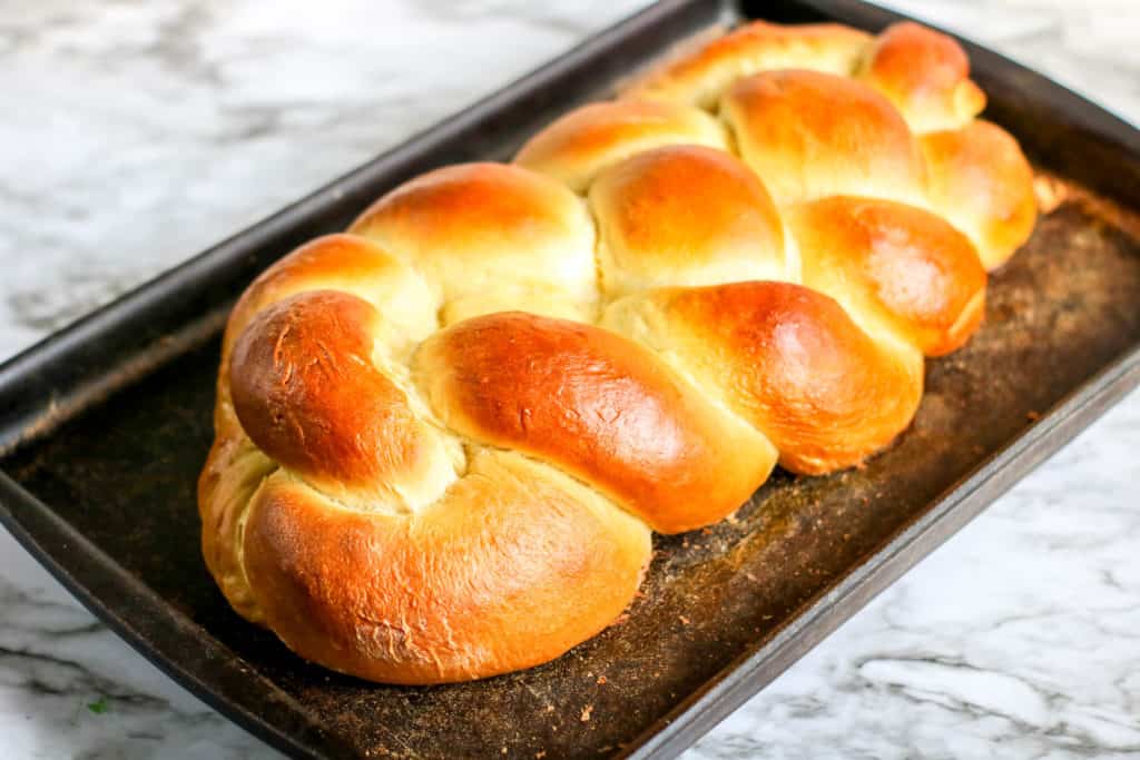 This delicious olive oil challah bread recipe is a variation of the traditional version that is ideal for Hanukkah and the festival of lights.