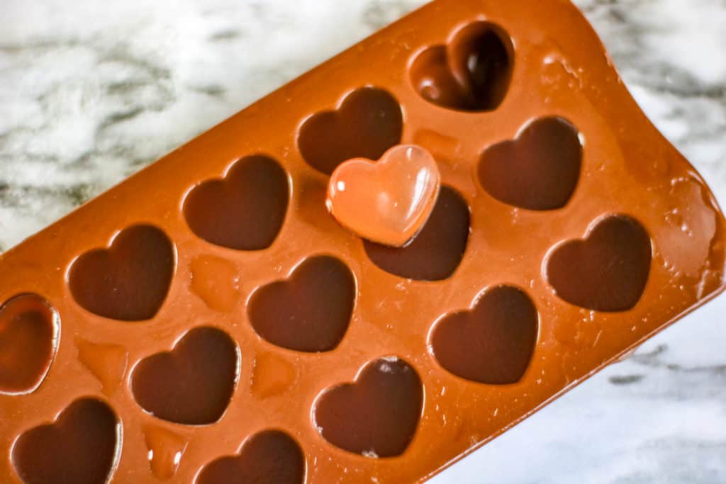 Make your own homemade heart-shaped gummies with this simple and easy recipe. It only has 3 ingredients!
