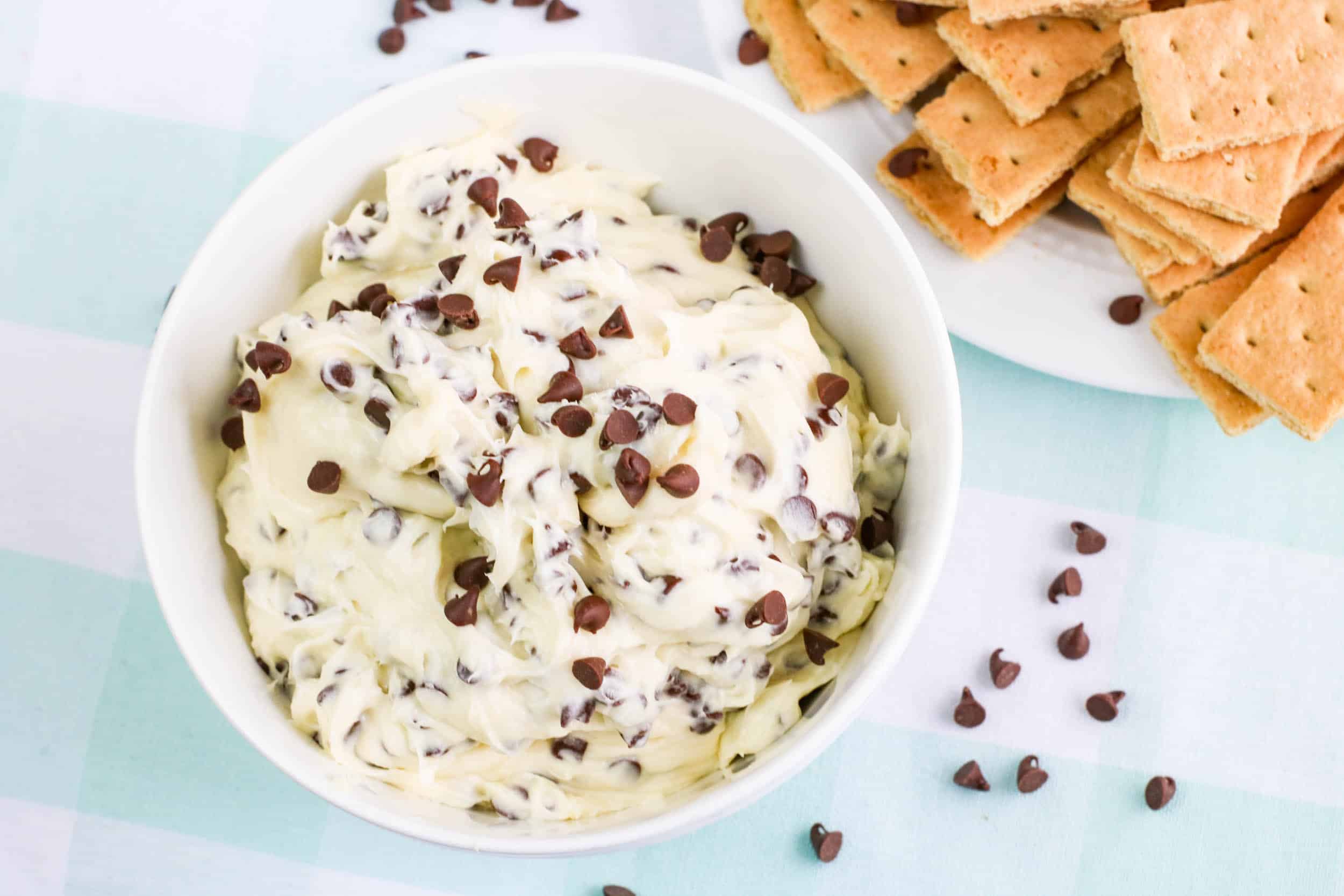 You won't believe how easy it is to make this chocolate chip cookie dough dip recipe in less than five minutes.