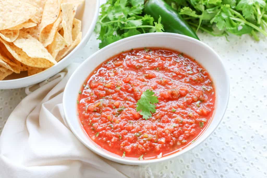 This homemade salsa recipe is easy to make, delicious, and uses canned tomatoes.