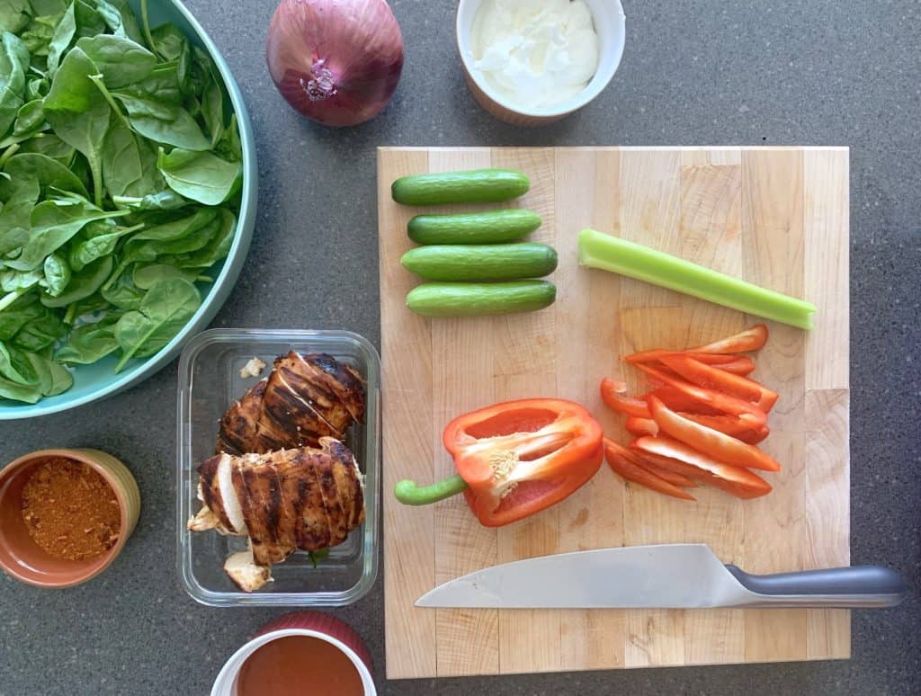 This healthy buffalo chicken salad has a little kick that only enhances how delicious it is. Here's how to make it in minutes!