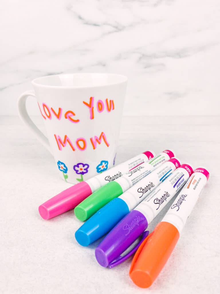 This easy and adorable personalized mug can be made at home and is the perfect Mother's Day gift. Let your kids decorate it with markers and then fill with candy, tea bags or bath products.