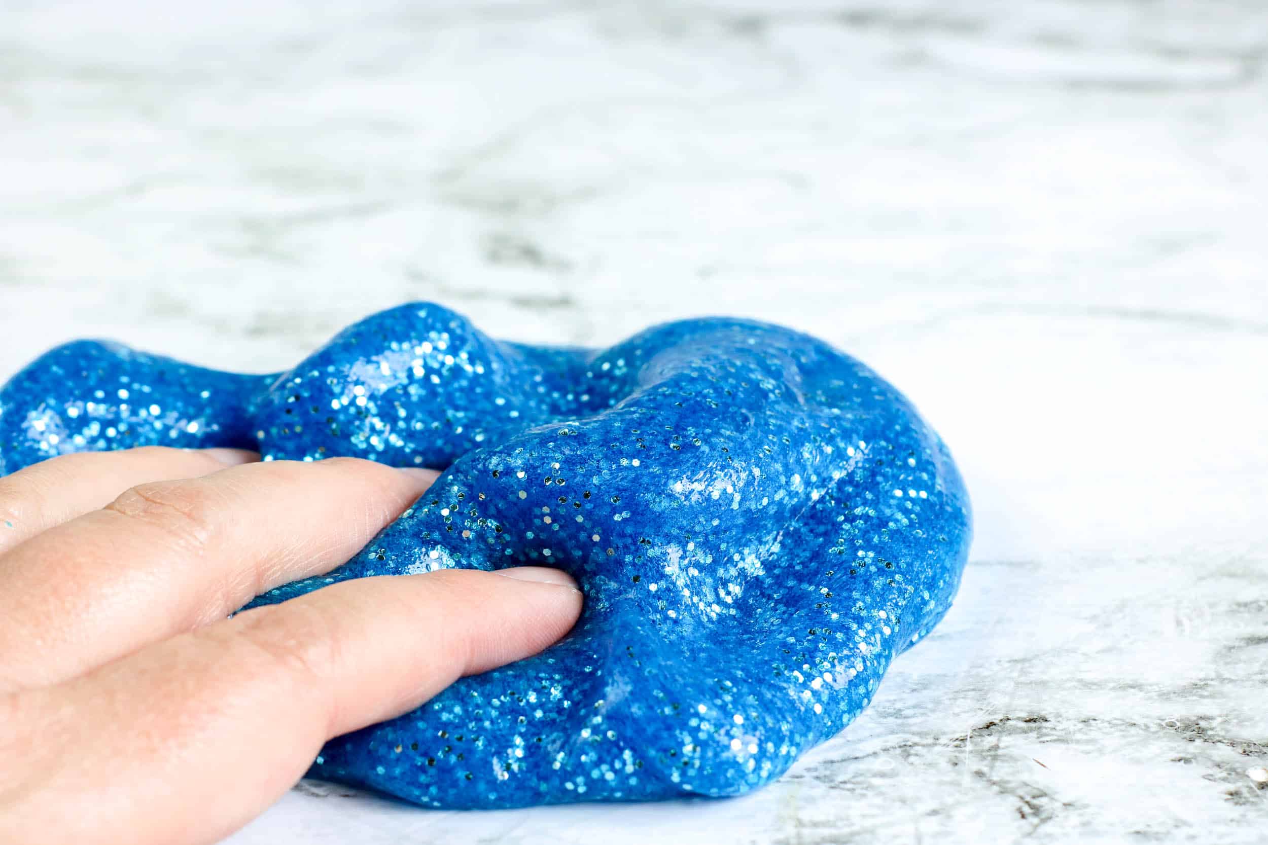 This sparkly blue ocean slime is so satisfying to make and look at! 