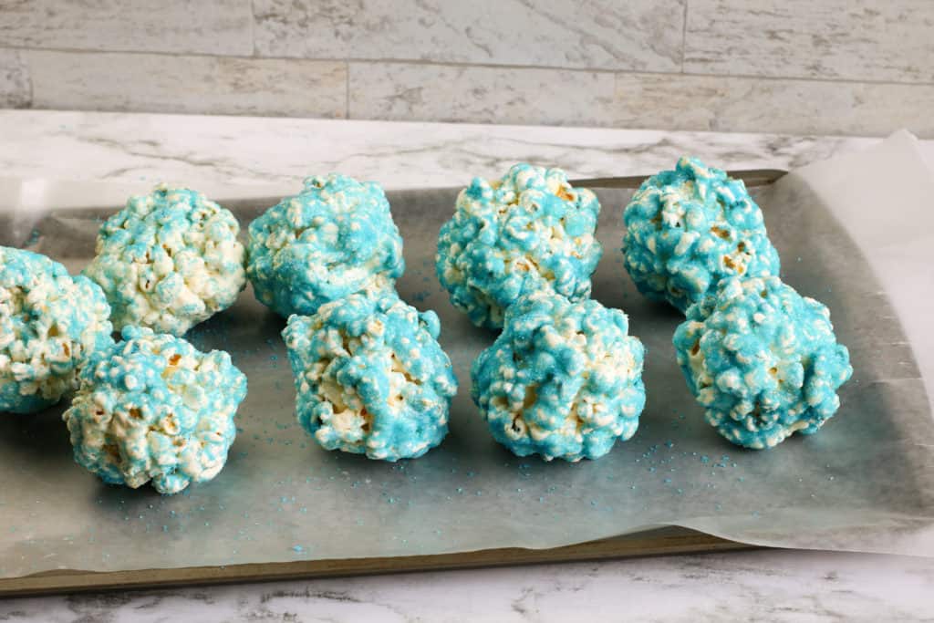 Frozen fans will love these delicious white chocolate popcorn balls.