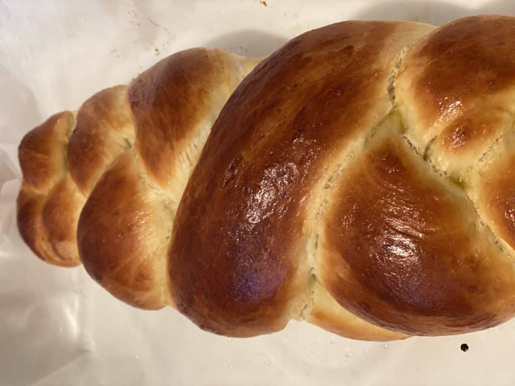 This delicious, fluffy challah recipe is slightly sweet and very easy to make. It's my family's favorite bread.