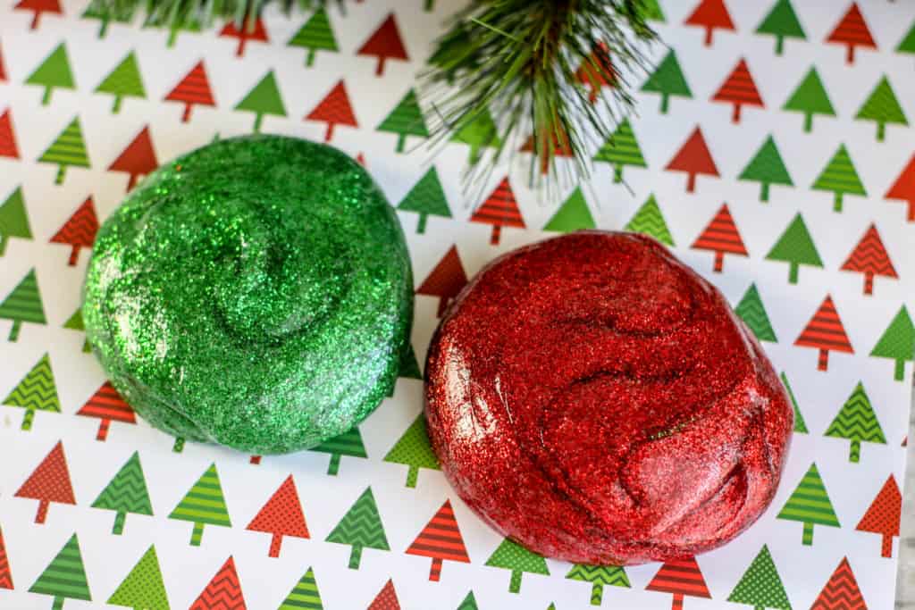 This festive and colorful red and green Christmas slime is super easy to make and so satisfying. Kids love to make it!