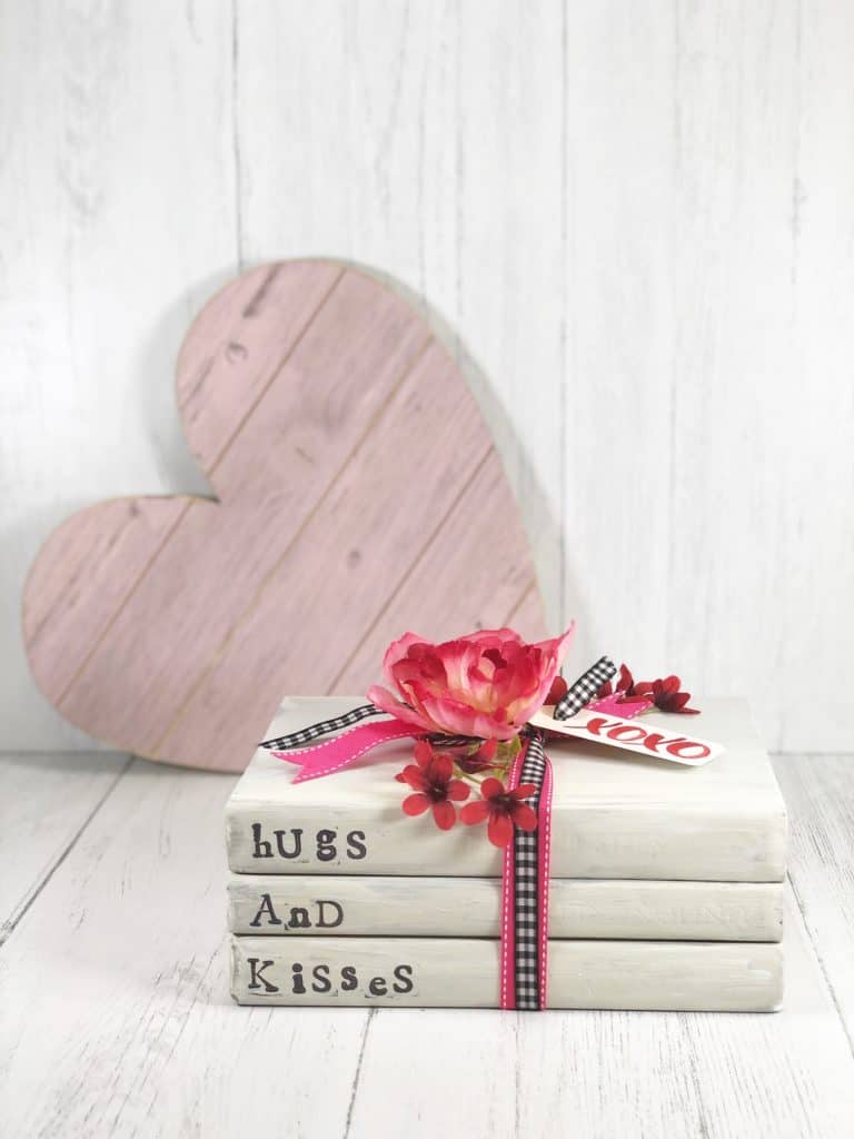 This adorable Hugs and Kisses book stack DIY will instantly allow you to create your own farmhouse style home décor with a sweet message.