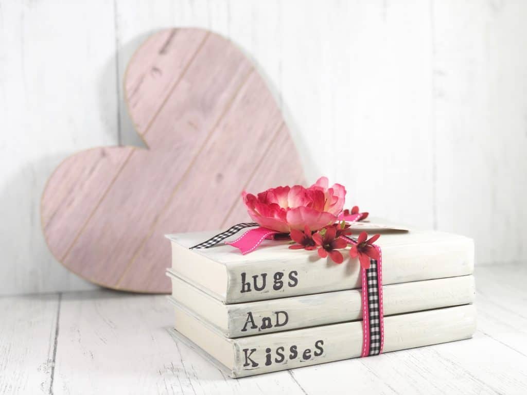 This adorable Hugs and Kisses book stack DIY will instantly allow you to create your own farmhouse style home décor with a sweet message.