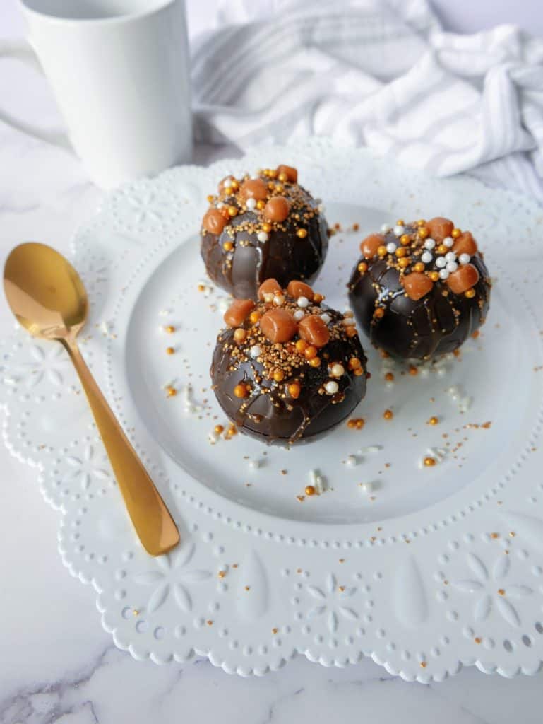 These homemade salted caramel hot cocoa bombs will change the way you drink hot chocolate forever. They are simply irresistible! And you can even substitute the caramel candy for dulce de leche.