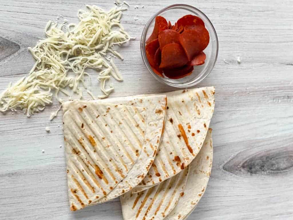 Make this delicious pizza tortilla wrap in a few minutes using the viral TikTok hack.