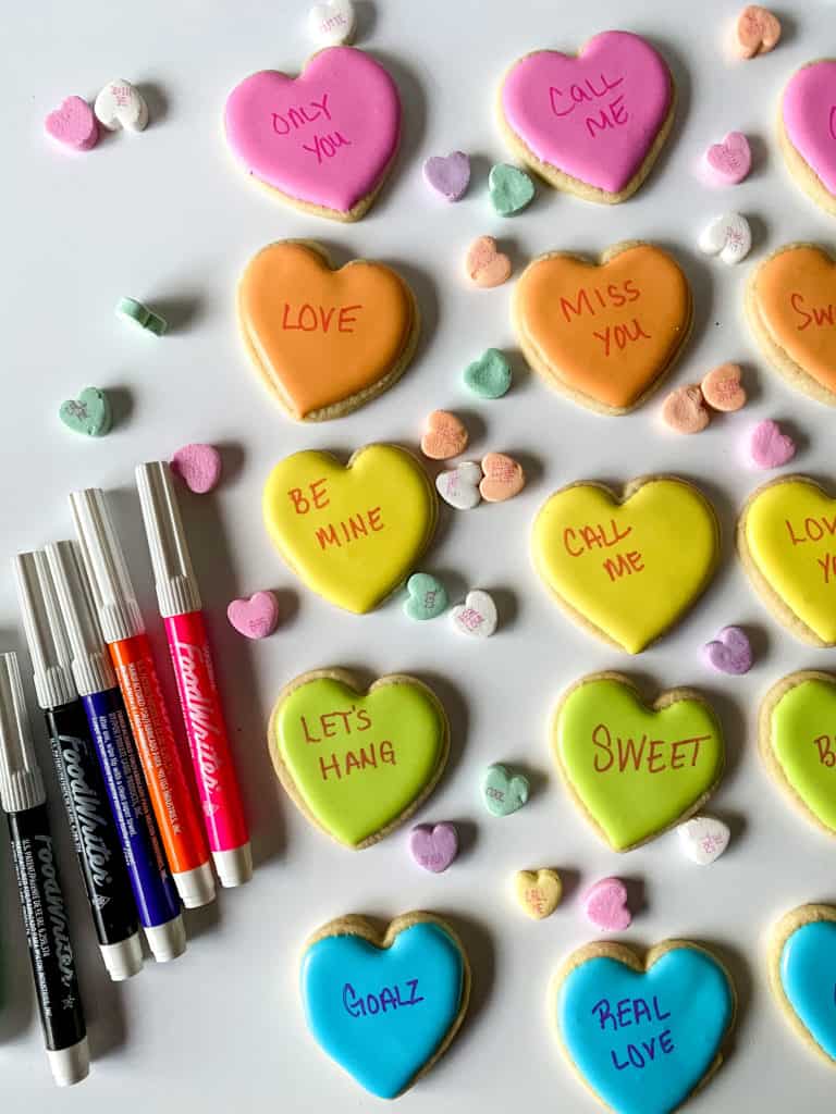 These adorable conversation heart cookies are so easy to make. They're perfect for bridal showers, anniversaries, proposals or Valentine's Day!