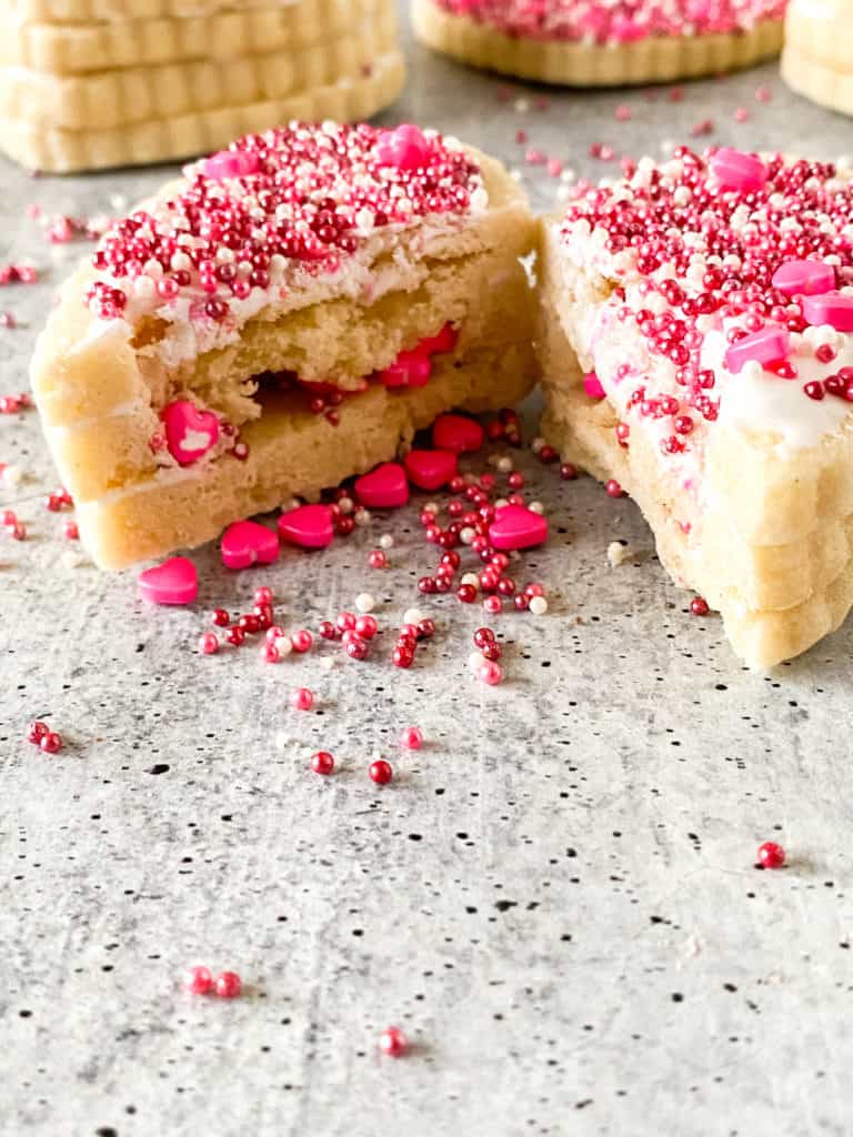 These might be the most amazing Valentine's Day sugar cookies ever. Follow the steps so you can bake your own edible sugar cookie box and fill it with sprinkles. Yum!