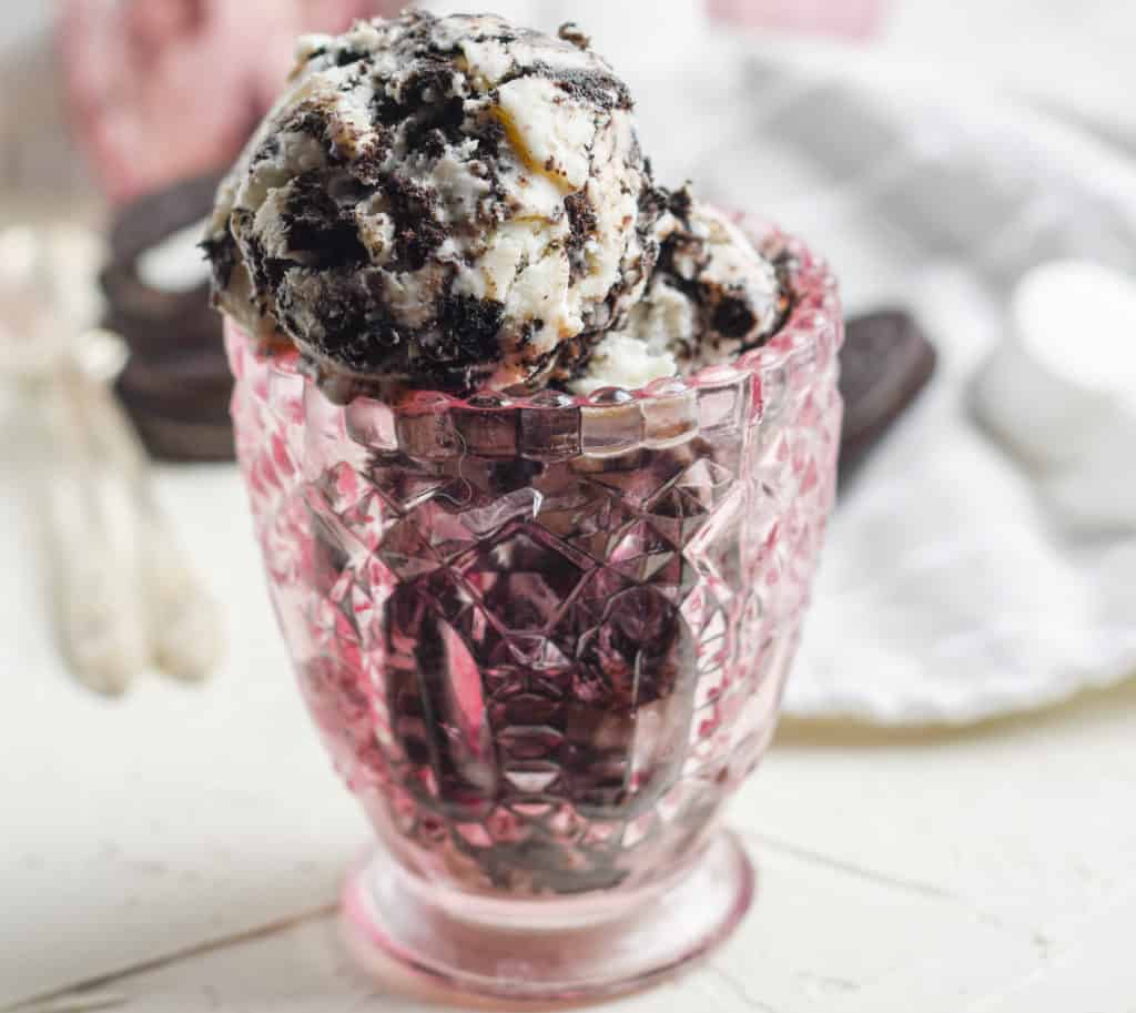 This simple no churn, homemade Oreo ice cream recipe can be made in under 10 minutes and only requires 4 ingredients.