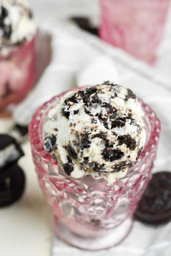This simple no churn, homemade Oreo ice cream recipe can be made in under 10 minutes and only requires 4 ingredients.