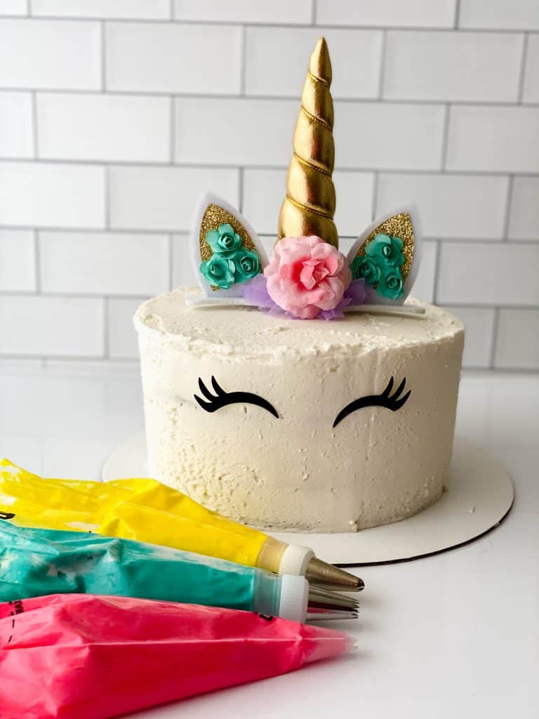 Create a gorgeous unicorn cake at home. This rainbow unicorn cake is so easy to make with these step by step instructions and video. 