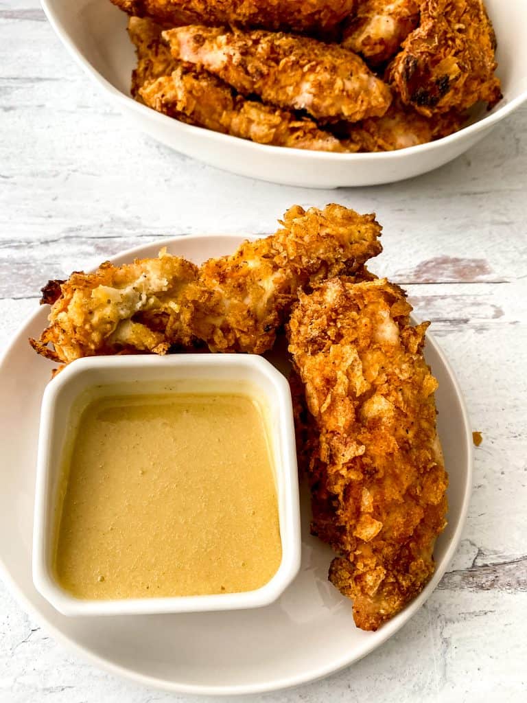 Crunchy baked chicken tenders with sauce