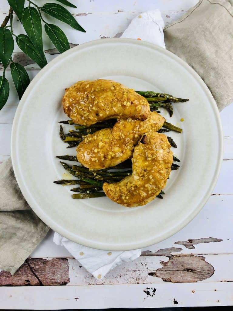 This easy and tasty honey mustard chicken only requires 5 ingredients. Serve it with asparagus for a healthy and yummy meal.