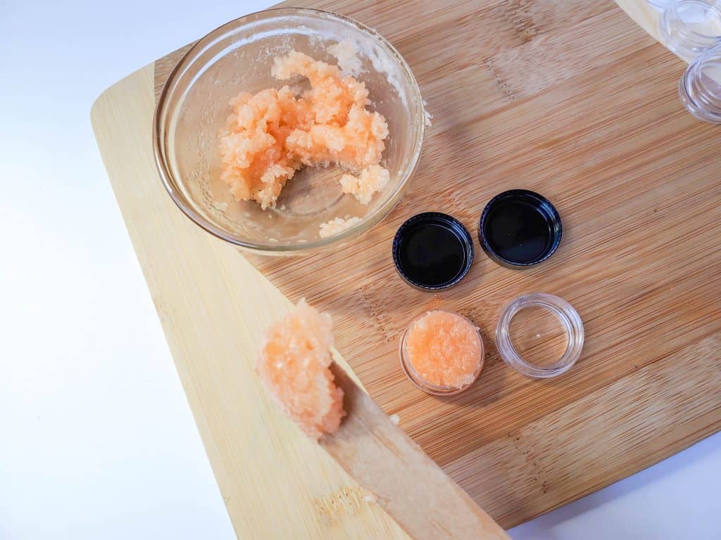 Learn how to make your own homemade exfoliating lip scrub in just three simple steps using natural ingredients.