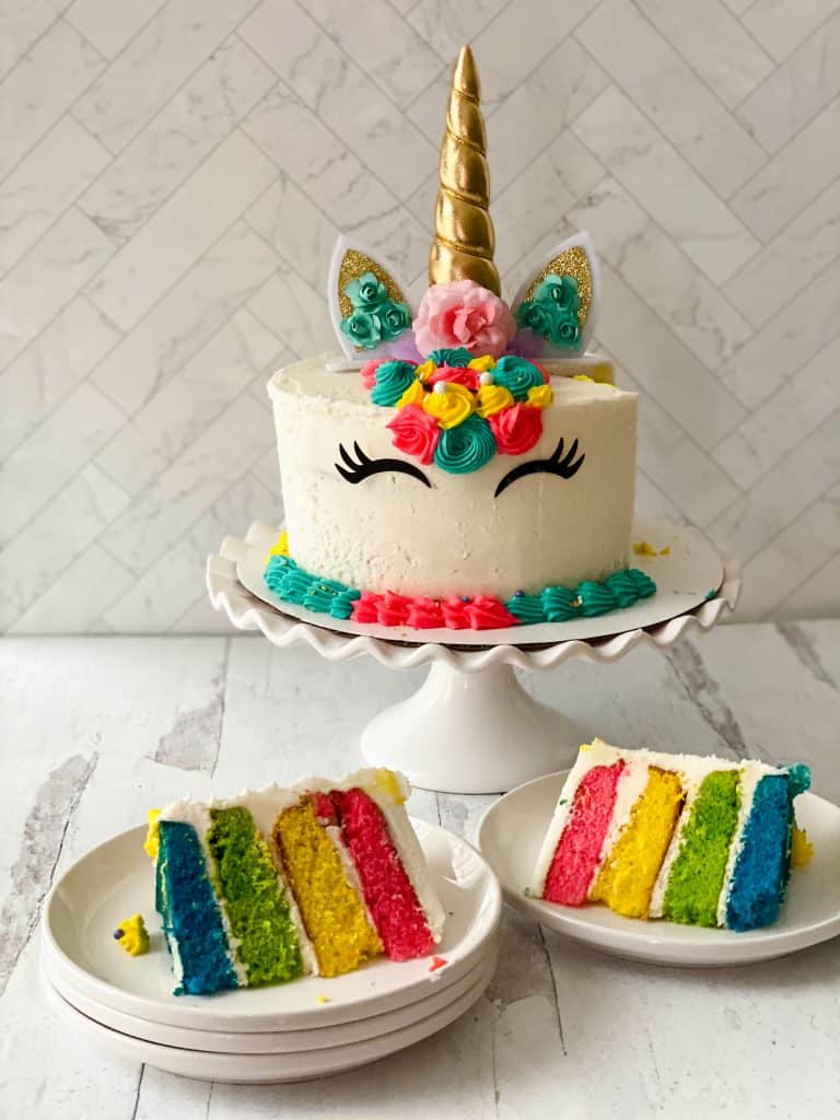 Create a gorgeous unicorn cake at home. This rainbow unicorn cake is so easy to make with these step by step instructions and video. 