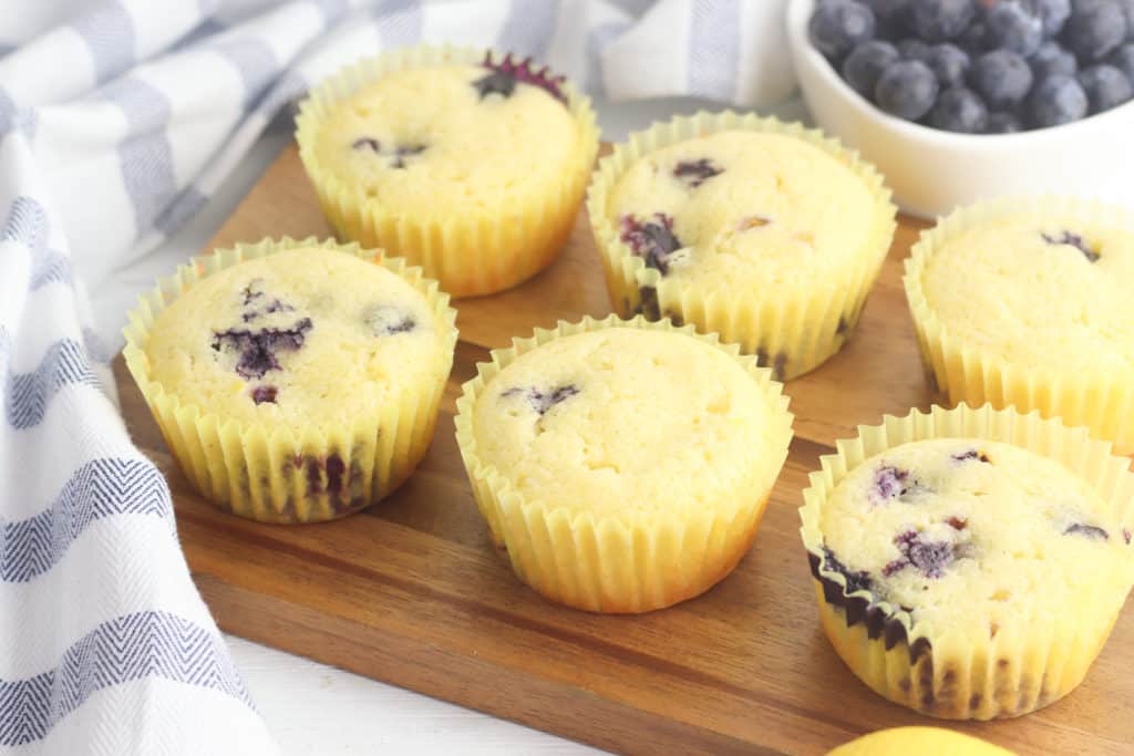 These gluten free lemon blueberry muffins are beyond amazing. Serve them for breakfast or anytime you're craving a lemon blueberry baked treat.