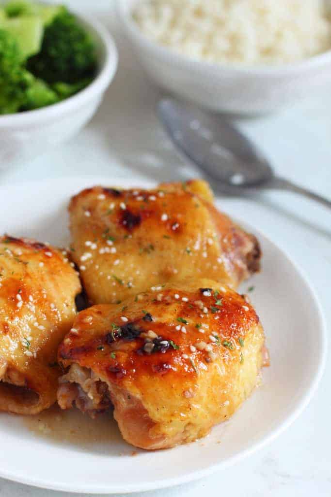 This super easy honey soy sesame chicken thighs recipe is sweet and savory with a touch of crunch. So tender, juicy, and absolutely delicious!