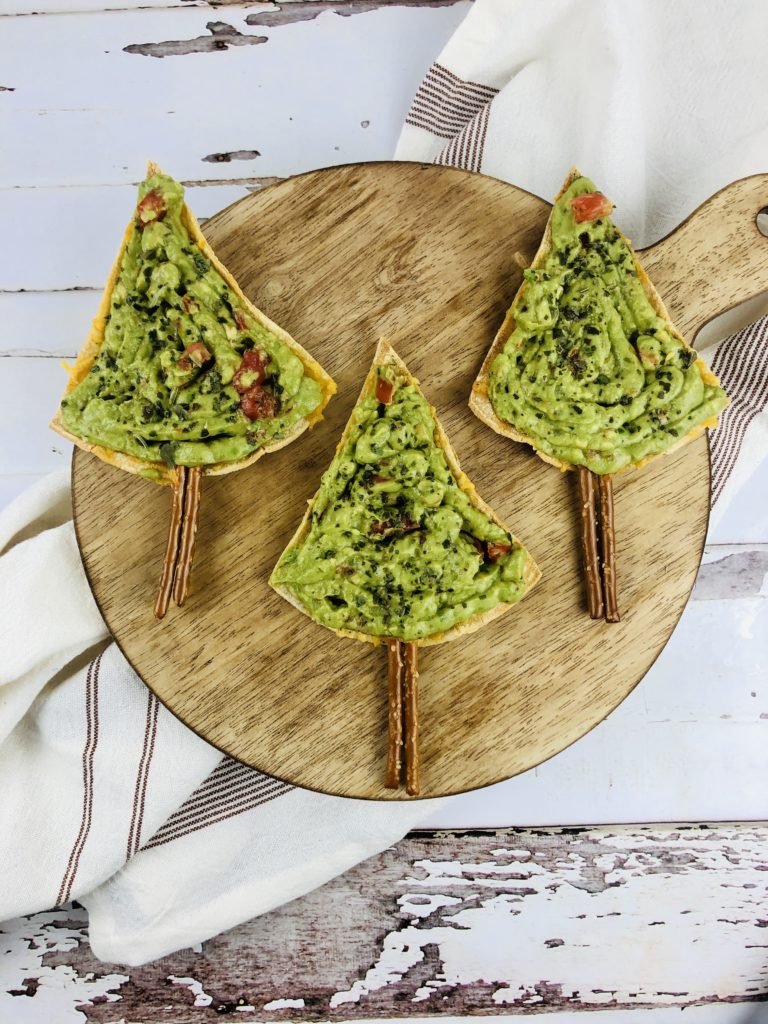 These Christmas tree nachos are the perfect holiday appetizer that will surprise and delight guests. It is so easy to make!