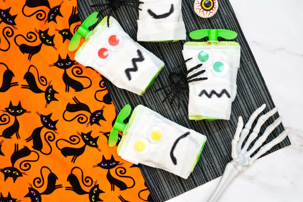 If you are looking for an allergy-friendly Halloween treat, you will love the applesauce mummy. These spook-tacular snacks are incredibly easy to make, require only a handful of supplies, and will bring an extra dose of festive fun to your Halloween party.