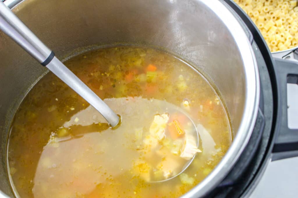 This easy Instant Pot turkey soup recipe will delight the whole family and is the perfect way to use Thanksgiving leftovers.