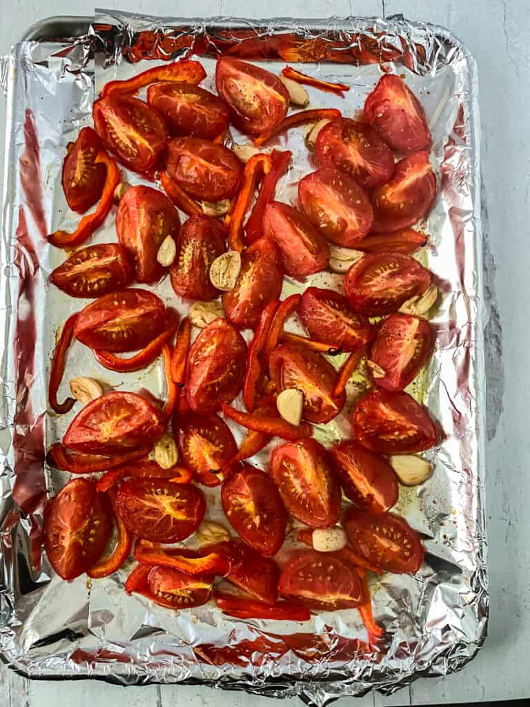 The best homemade roasted tomato recipe is also easy to make. The fresh tomatoes and peppers are roasted in the oven with garlic for a flavorful mix.