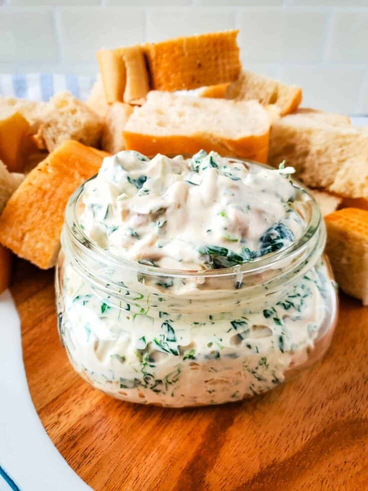 Easy spinach dip served with sliced French bread