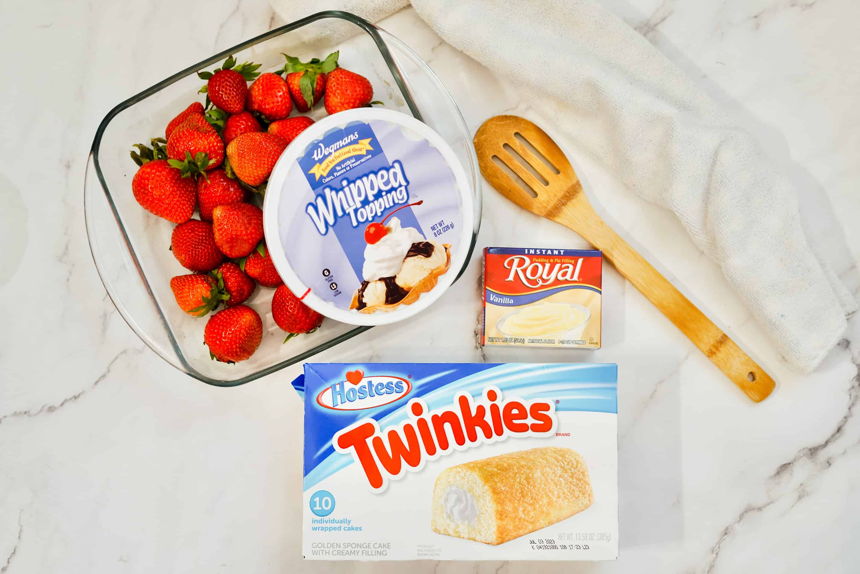 This no bake strawberry Twinkie cake is the perfect summer dessert. It's also so easy to make! here are the ingredients.