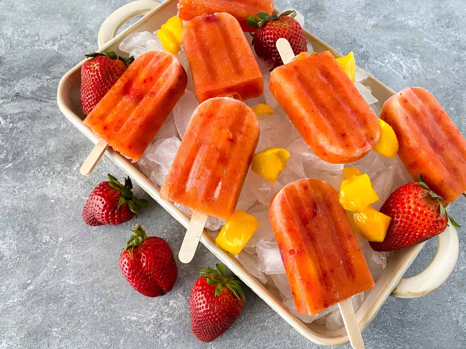 Healthy homemade strawberry mango popsicles recipe - Hispana Global