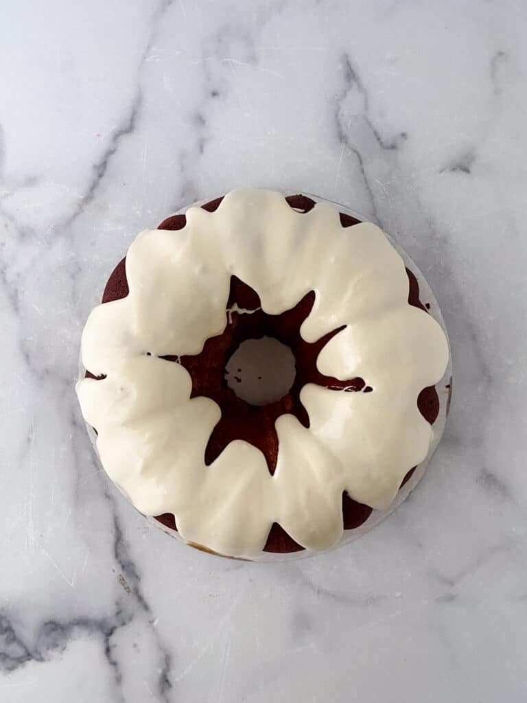 Discover the art of making a delectable Red Velvet Pound Cake from scratch with our easy-to-follow recipe. Savor the velvety texture and rich flavors, complemented by a tantalizing cream cheese glaze. 