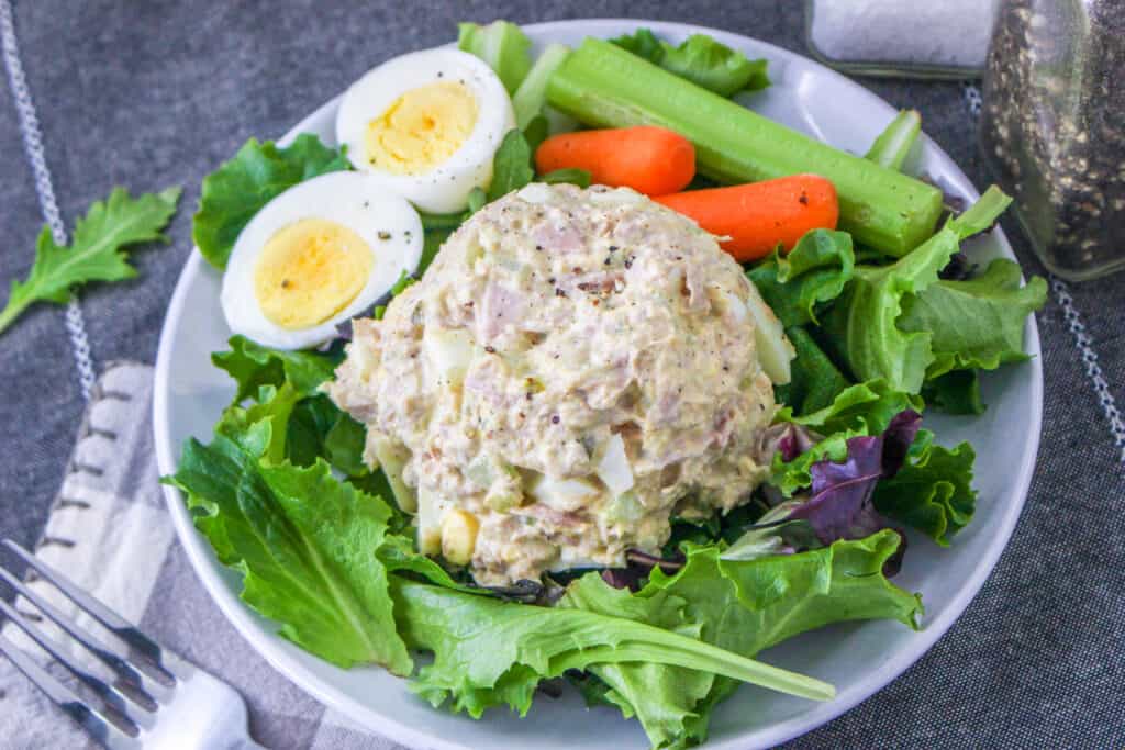 When you need a quick meal, this is the easiest tuna salad recipe you will find. In just two steps, make this mouthwatering salad that is a great source of protein and is a great option for quick school lunches.
