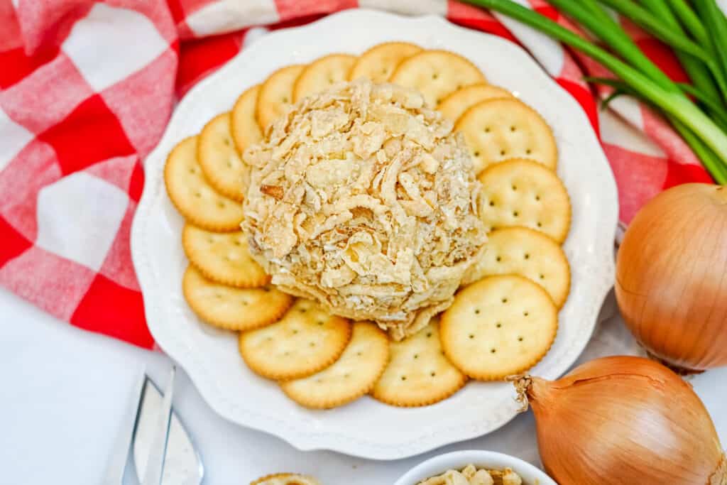 This delicious French Onion Cheeseball is the perfect appetizer to elevate your gatherings and impress your guests. Combining the rich flavors of French onion soup mix with creamy goodness, this easy cheese ball recipe is a crowd-pleaser that's incredibly easy to make in just 10 minutes. 