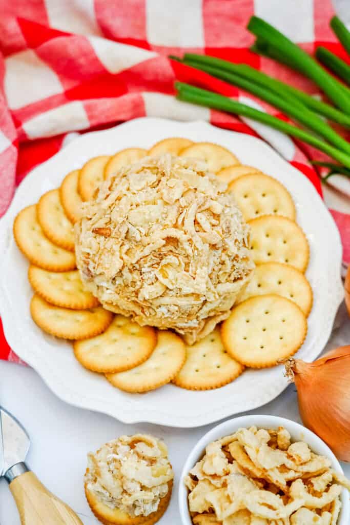 This delicious French Onion Cheeseball is the perfect appetizer to elevate your gatherings and impress your guests. Combining the rich flavors of French onion soup mix with creamy goodness, this easy cheese ball recipe is a crowd-pleaser that's incredibly easy to make in just 10 minutes. 