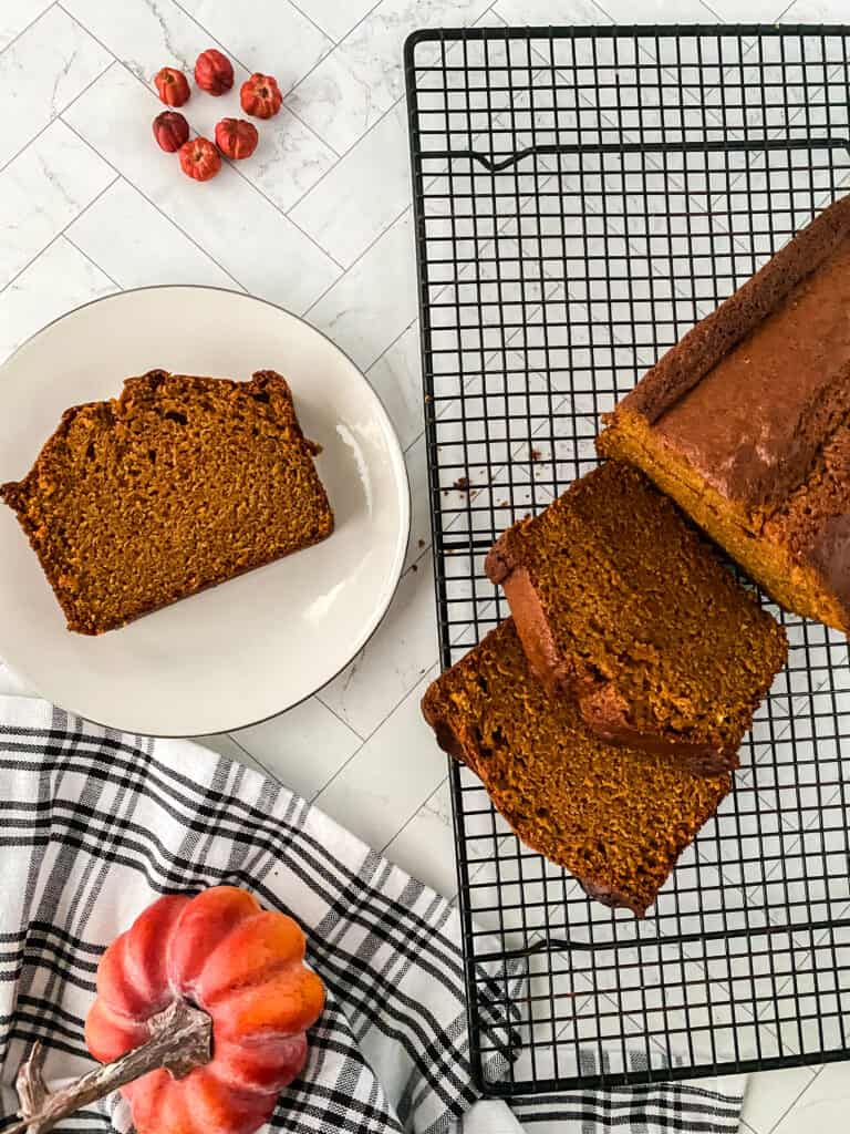 There is something so cozy and comforting about having a slice of homemade pumpkin bread with a cup of coffee or tea, especially when the temperatures drop or it's rainy outside. If you're craving this delightful fall treat but don't want to leave your home, this easy pumpkin bread recipe will more than satisfy you. It will also fill your home with the scent of fresh bread! That's why my family loves it when I bake this moist pumpkin bread.