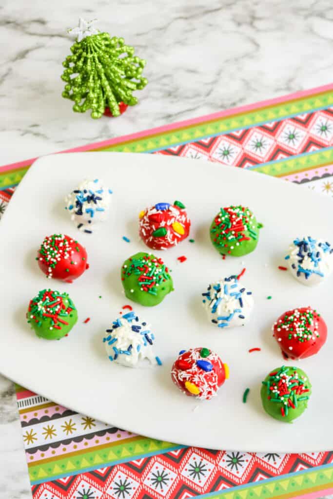 Indulge in this Ugly Sweater Oreo Balls recipe for a festive, no-bake treat that's as fun to make as it is to eat! Perfect for holiday parties and Ugly Sweater Day celebrations. 