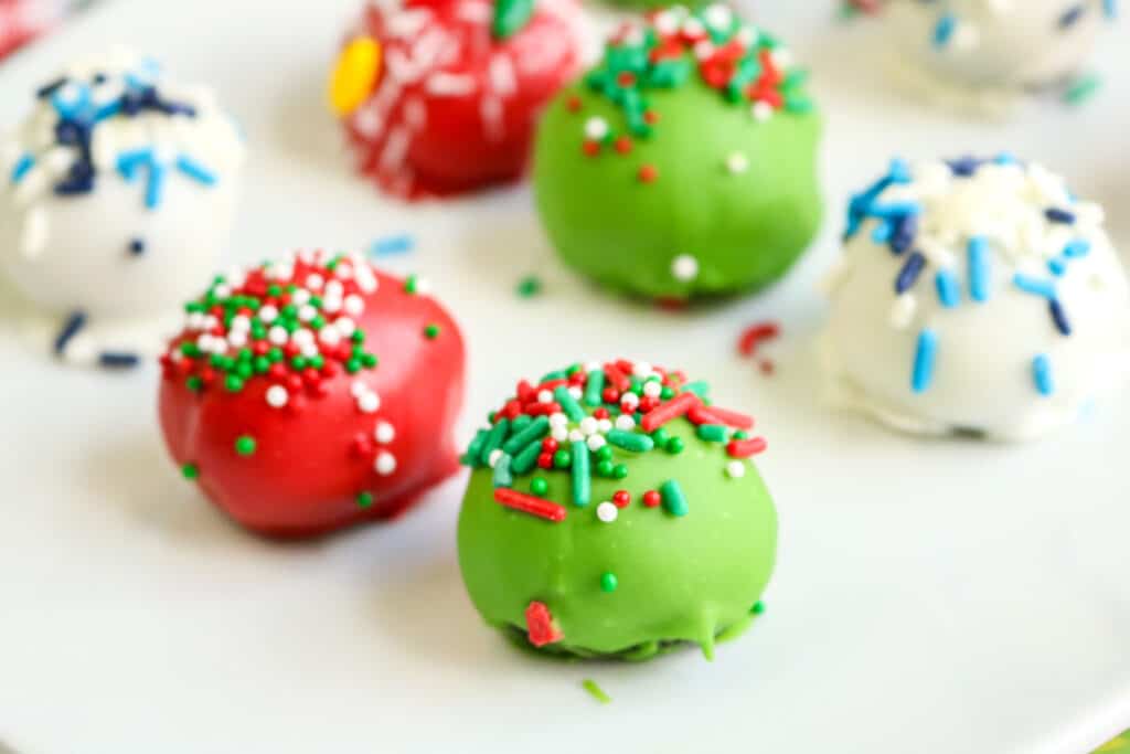 Indulge in this Ugly Sweater Oreo Balls recipe for a festive, no-bake treat that's as fun to make as it is to eat! Perfect for holiday parties and Ugly Sweater Day celebrations. 