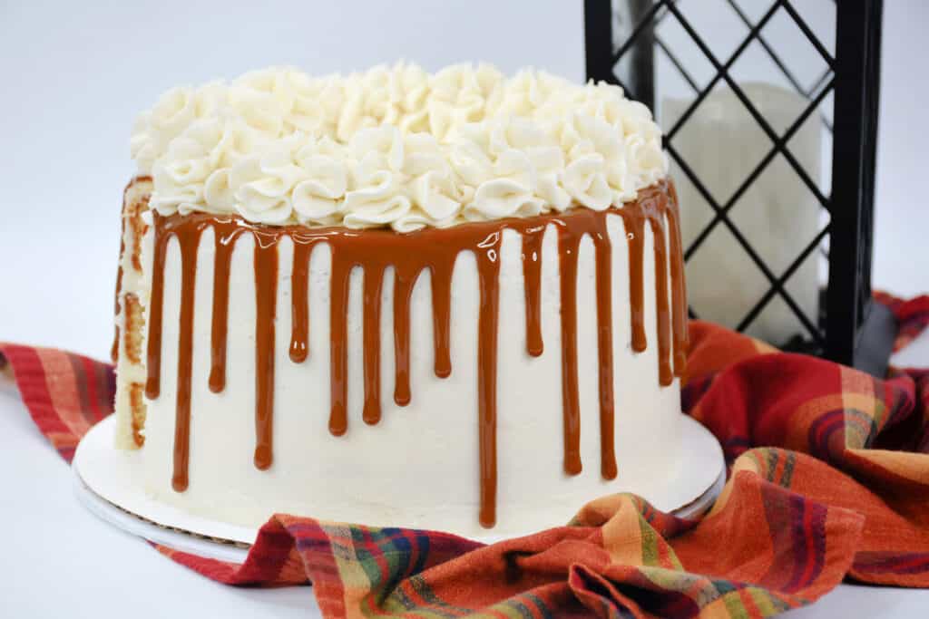 Indulge in the rich and creamy delight of my family's favorite Dulce de Leche Cake recipe. A perfect blend of moist vanilla cake, luscious Dulce de Leche, and smooth vanilla frosting. 