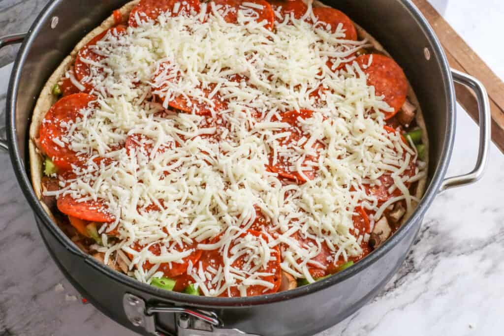 If you love pizza, but are watching carbs, this recipe is for you. Enjoy a delicious a low carb deep dish pizza you can make in minutes!