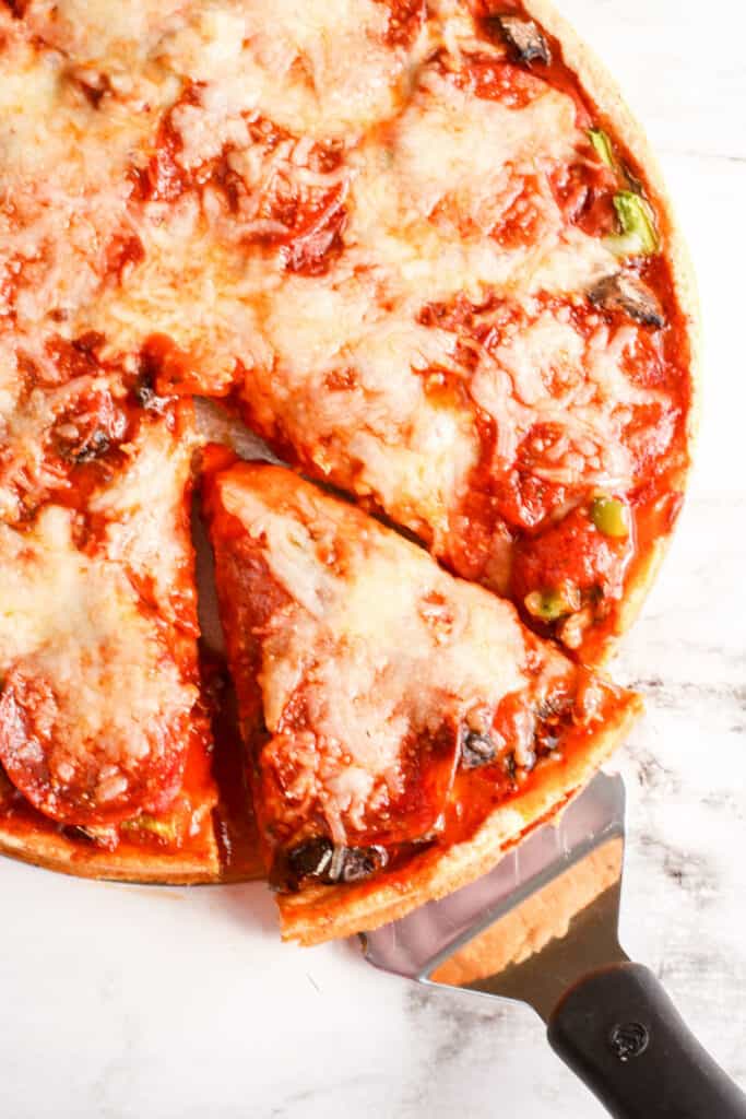 If you love pizza, but are watching carbs, this recipe is for you. Enjoy a delicious a low carb deep dish pizza you can make in minutes!