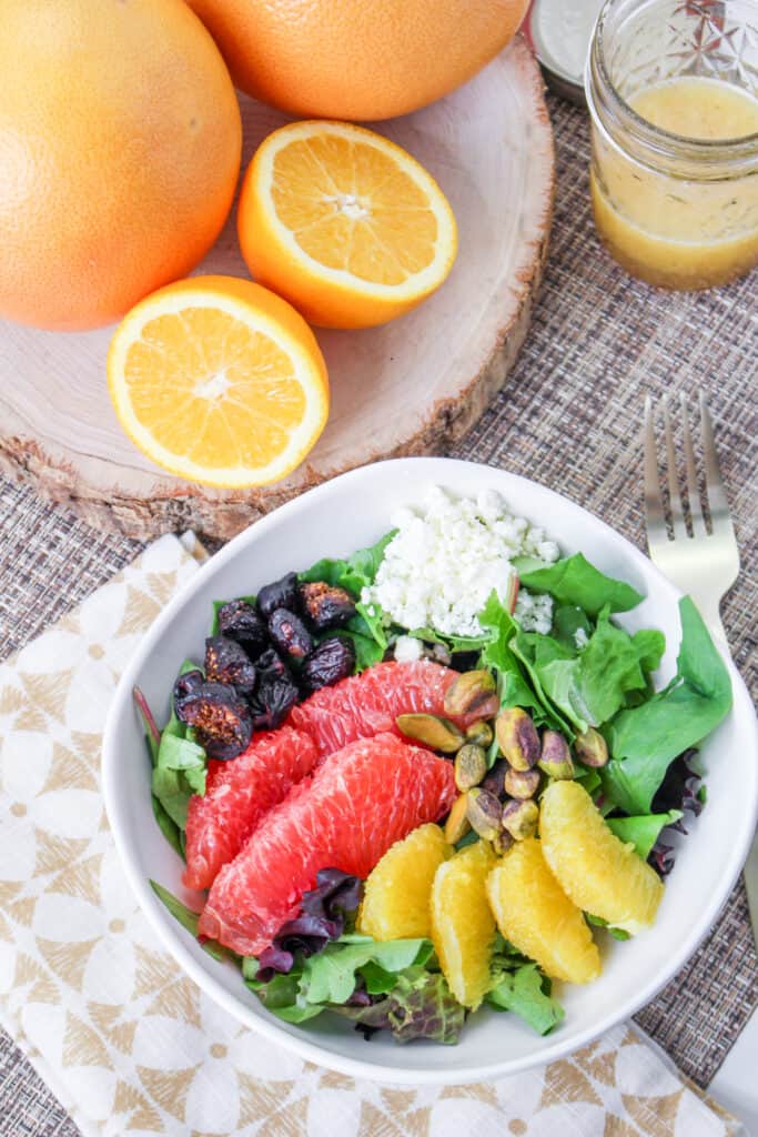 Indulge in the refreshing taste of winter with this easy-to-make Winter Citrus Salad recipe. Packed with juicy grapefruit, sweet oranges, tangy feta, and crunchy pistachios, it's a vibrant addition to any meal. Perfect for boosting immunity and brightening up your day. Try it now!