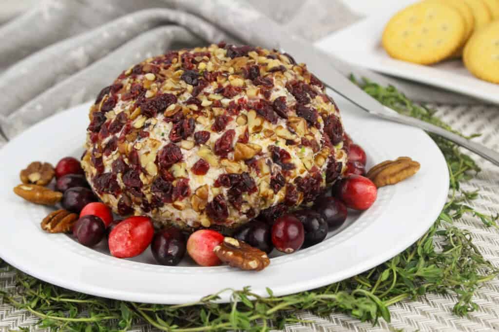 Looking for the perfect appetizer that’s quick, delicious, and festive? This Cranberry Pecan Cheeseball is a game-changer. With a combination of creamy, tangy, and sweet flavors, it’s a crowd-pleaser at any gathering. Whip it up in just 10 minutes!